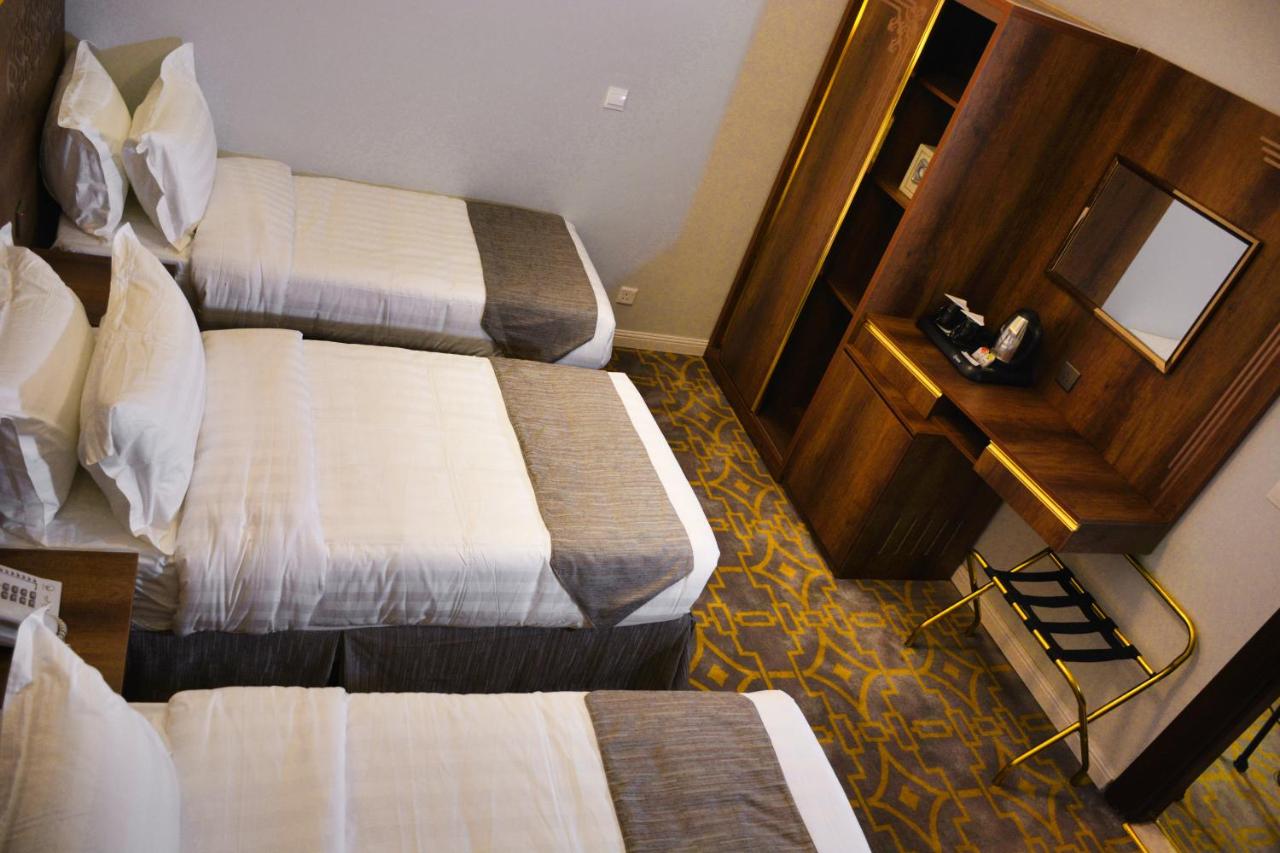 Kamar quad hotel Dar Al Naem Hotel